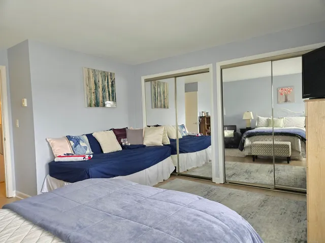 a bathroom with a toilet a sink and a shower