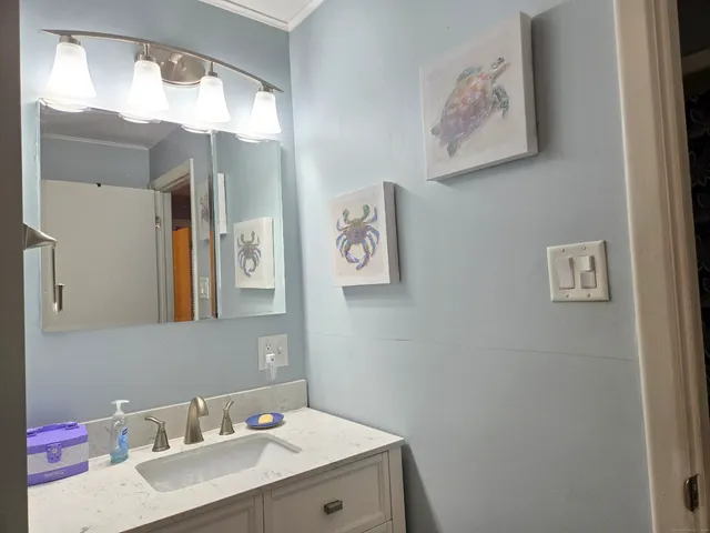 a living room with furniture or couch and a wooden floor