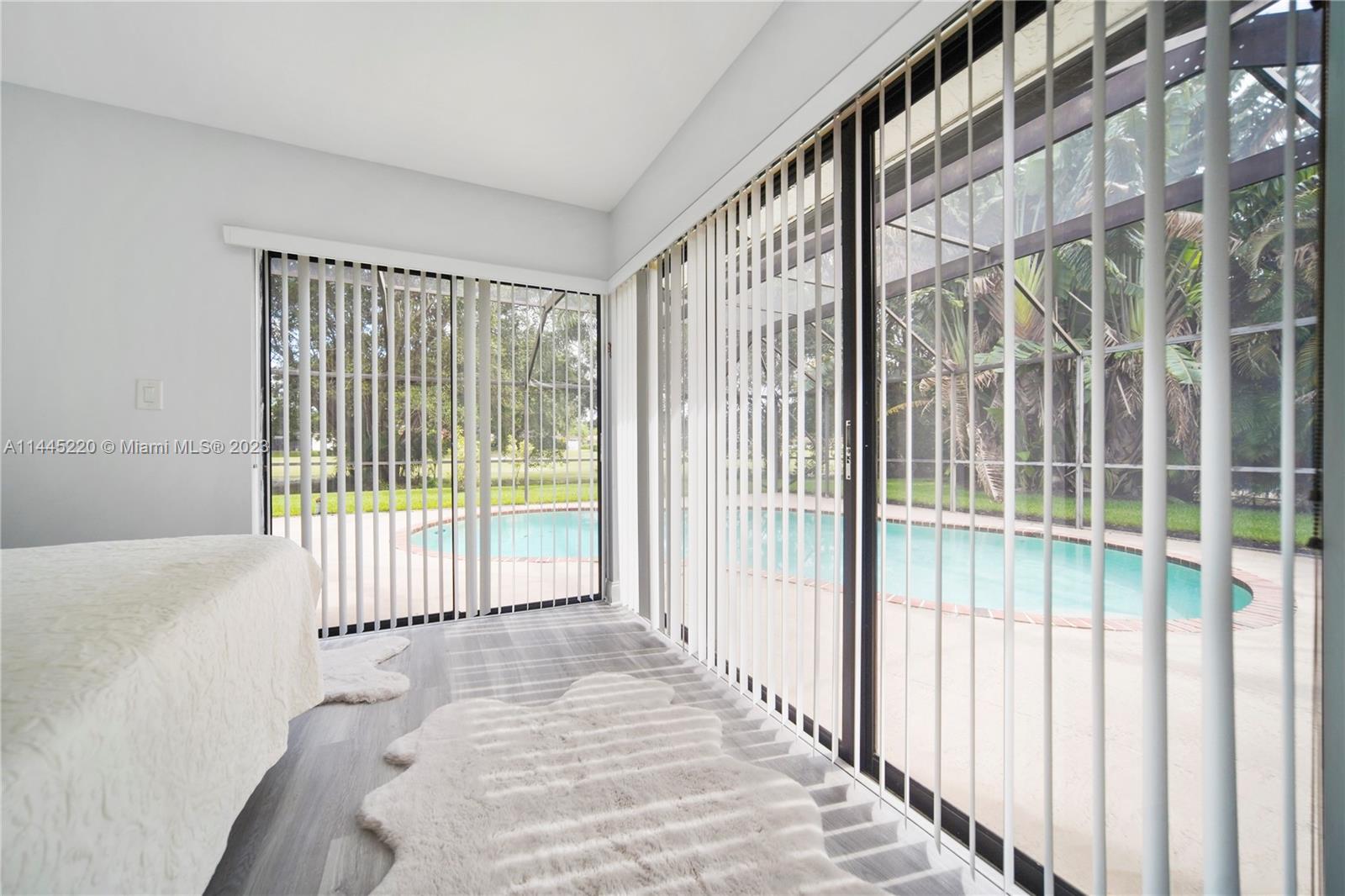 10161 Camelback Lane Boca Raton, FL 33498 - Photo 20 of 24 a bed sitting in front of a window