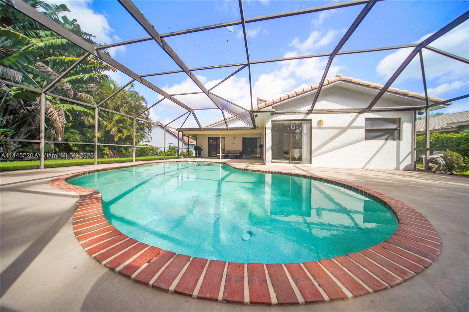10161 Camelback Lane Boca Raton, FL 33498 - Photo 5 of 24 a view of outdoor space with swimming pool