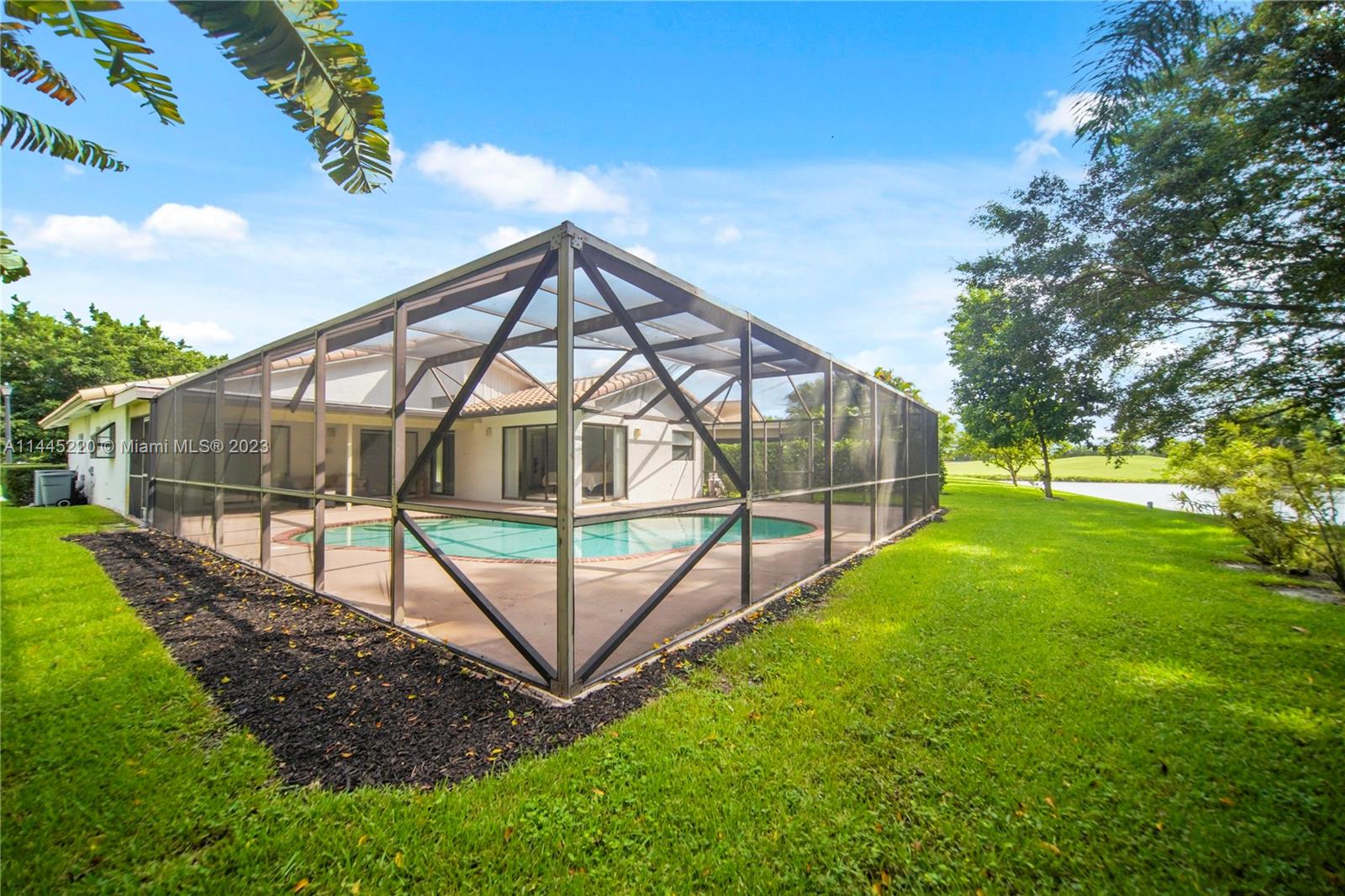 10161 Camelback Lane Boca Raton, FL 33498 - Photo 6 of 24 a view of a house with a yard