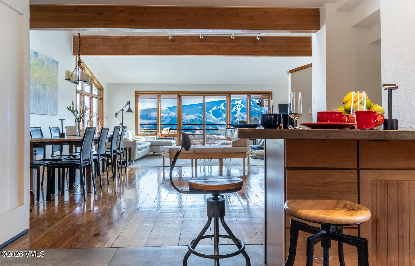 3016 Wildridge Road, Unit 6 Avon, CO 81620 - Photo 12 of 37 a view of a dining room with furniture and a chandelier