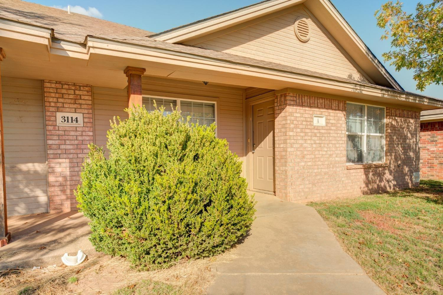 3114 109th Street Lubbock, TX 79423 - Photo 30 of 43 a view of a pathway with a house in front of it