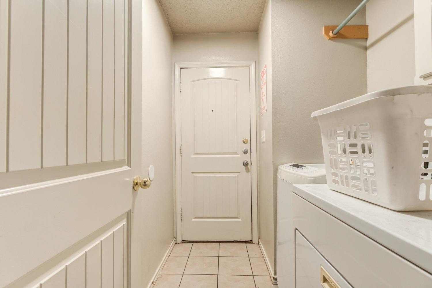 3114 109th Street Lubbock, TX 79423 - Photo 43 of 43 a bathroom with a sink a toilet and shower