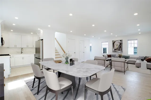 a view of kitchen with dining table and chairs