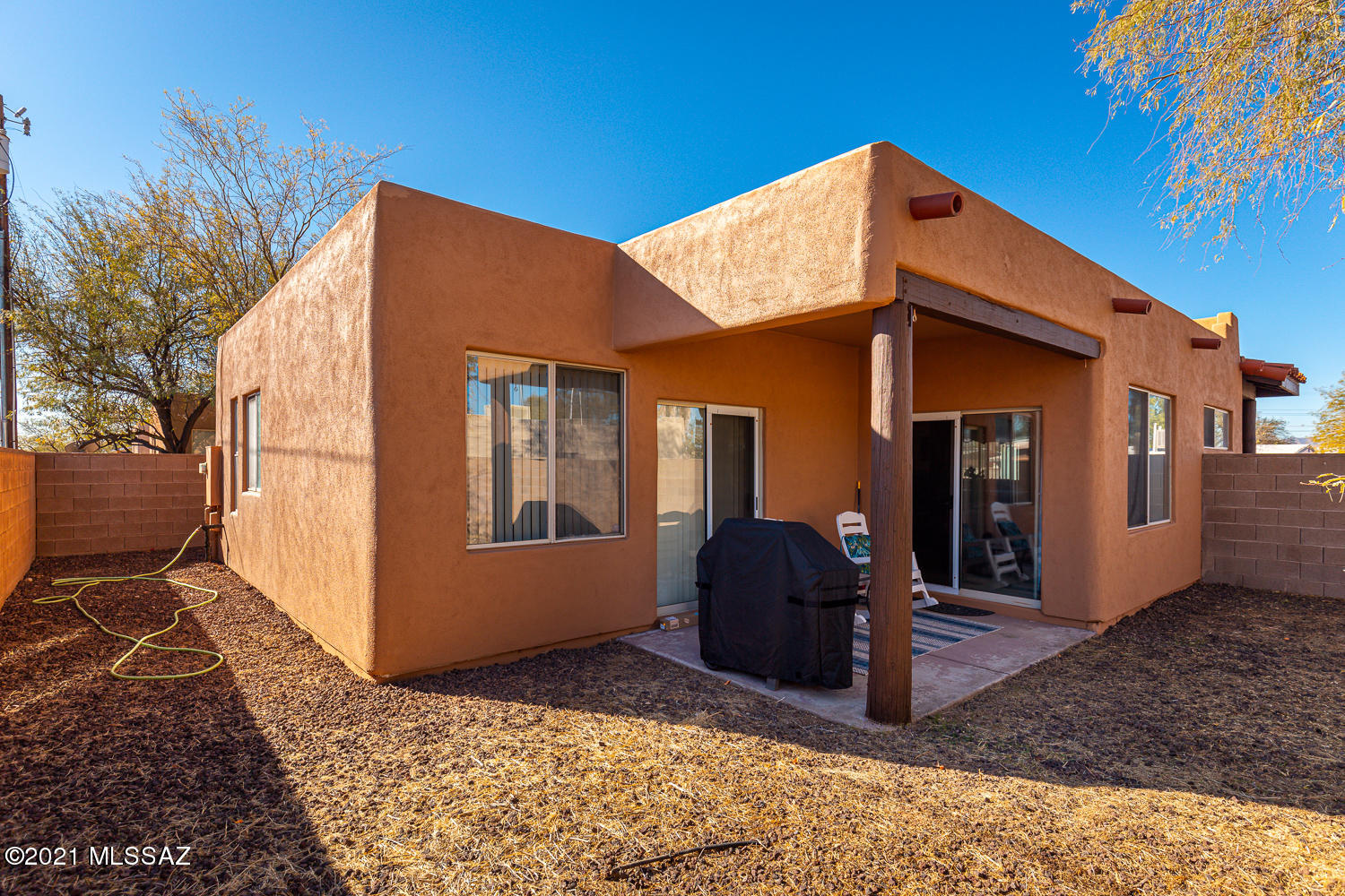 305 East Roger Road Tucson, AZ 85705 - Photo 8 of 15 a view of a house with a yard