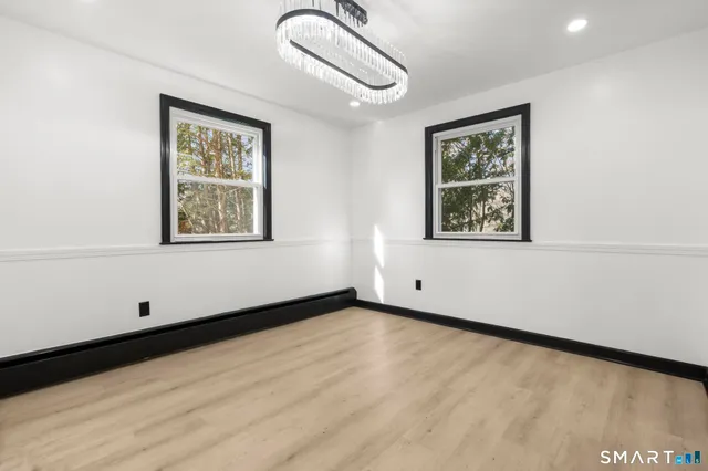 an empty room with windows