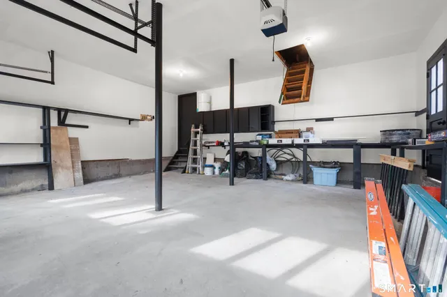 a view of an empty room with windows