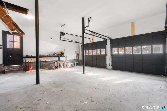 a view of a house with wooden deck