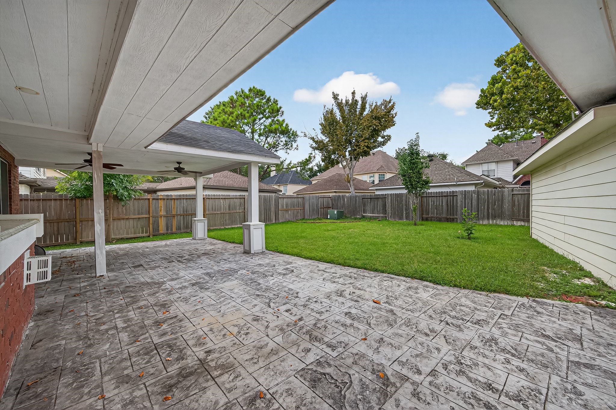 22406 Piper Terrace Lane Katy, TX 77450 - Photo 40 of 44 a view of a house with a backyard and a garden