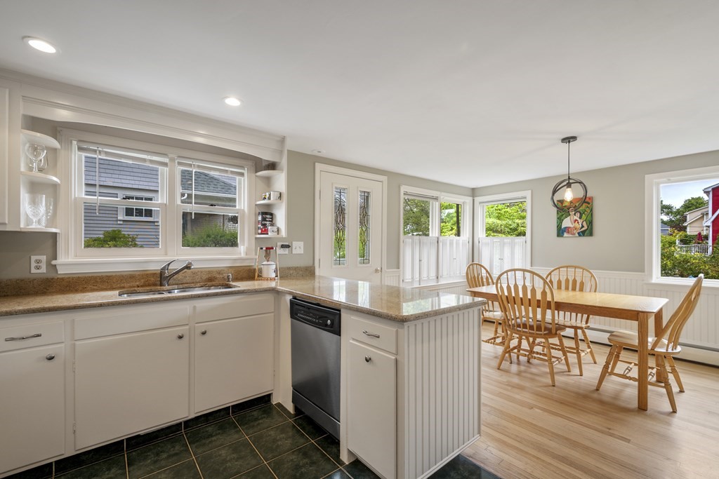 6 Treat Road Marblehead, MA 01945 - Photo 14 of 22 a kitchen with granite countertop a sink and cabinets