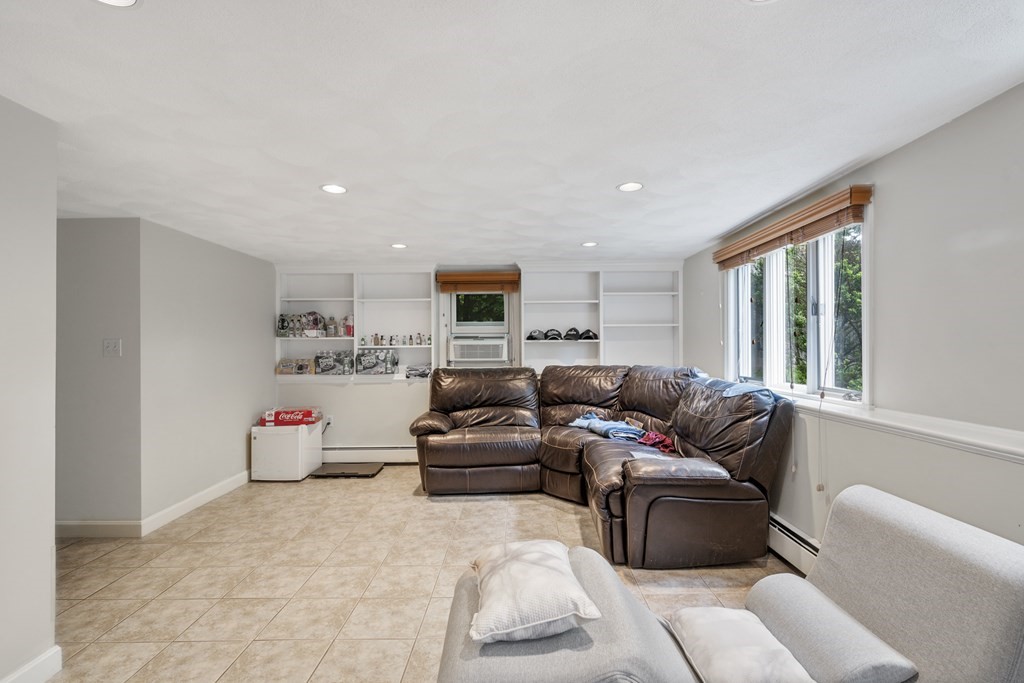 6 Treat Road Marblehead, MA 01945 - Photo 18 of 22 a living room with furniture and a window