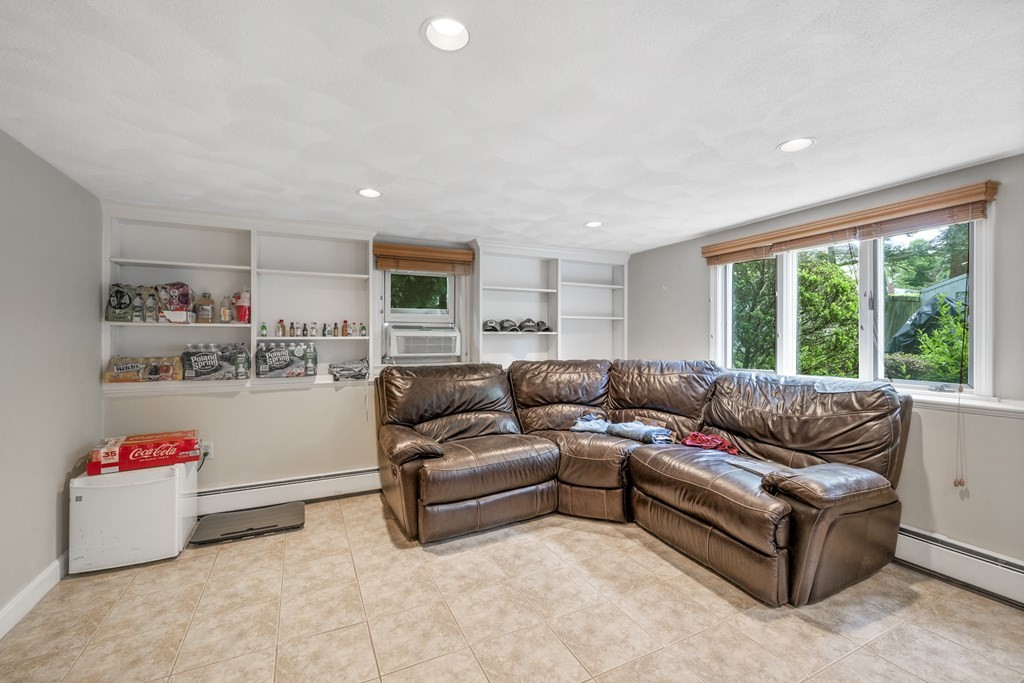 6 Treat Road Marblehead, MA 01945 - Photo 19 of 22 a living room with furniture and a large window