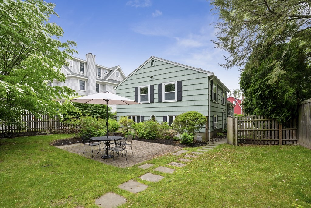 6 Treat Road Marblehead, MA 01945 - Photo 22 of 22 a front view of a house with a garden and plants