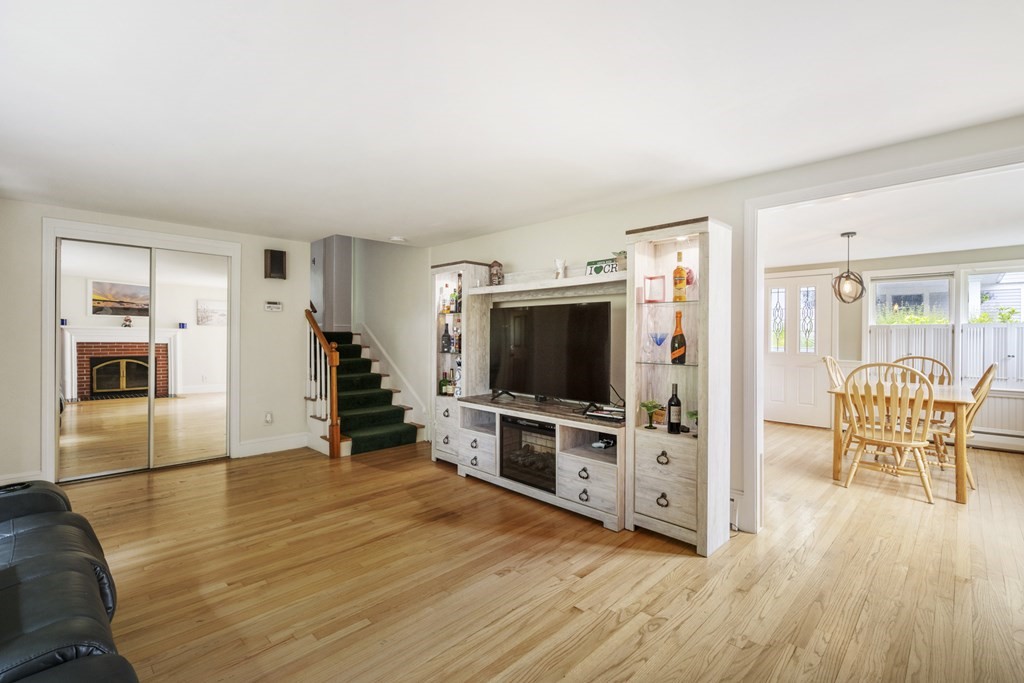 6 Treat Road Marblehead, MA 01945 - Photo 5 of 22 a living room with furniture and a flat screen tv