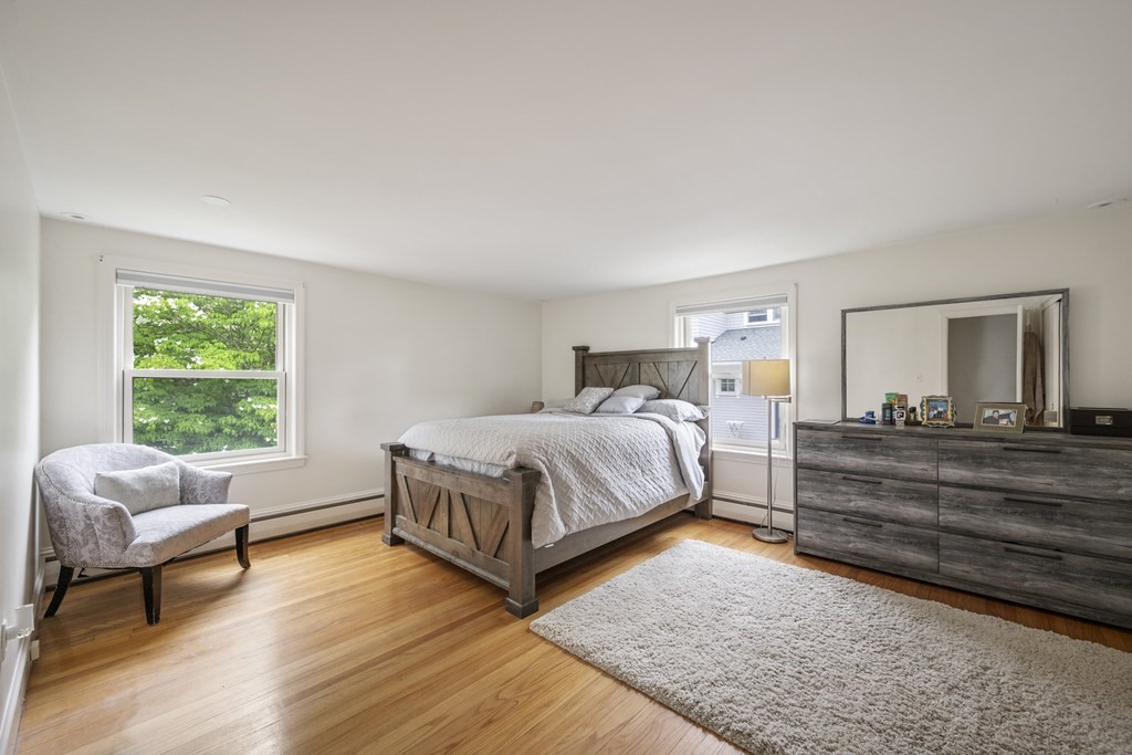 6 Treat Road Marblehead, MA 01945 - Photo 8 of 22 a bedroom with a bed and a couch