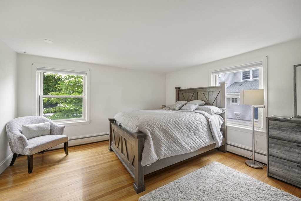 6 Treat Road Marblehead, MA 01945 - Photo 9 of 22 a bedroom with a bed and a couch
