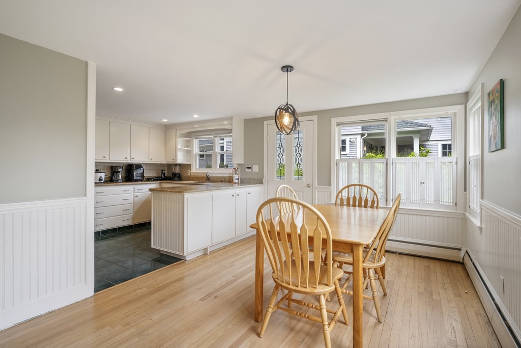 6 Treat Road Marblehead, MA 01945 - Photo 10 of 22 a view of a dining room with furniture and wooden floor