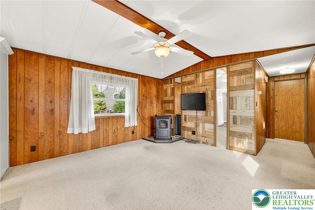 12 Revolutionary Road Mount Bethel, PA 18343 - Photo 16 of 53 a view of a bedroom with wooden floor and windows