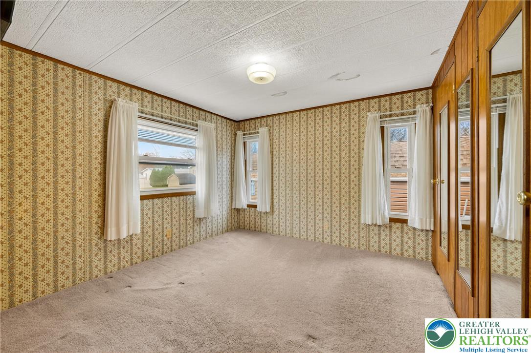 12 Revolutionary Road Mount Bethel, PA 18343 - Photo 20 of 53 a view of an empty room and a window