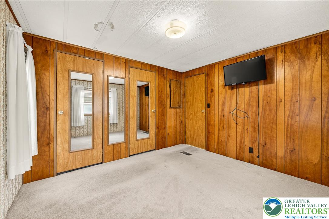 12 Revolutionary Road Mount Bethel, PA 18343 - Photo 25 of 53 a view of a livingroom with wooden floor and entryway
