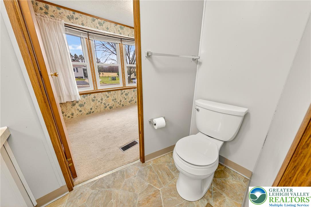 12 Revolutionary Road Mount Bethel, PA 18343 - Photo 28 of 53 a bathroom with a toilet and a shower