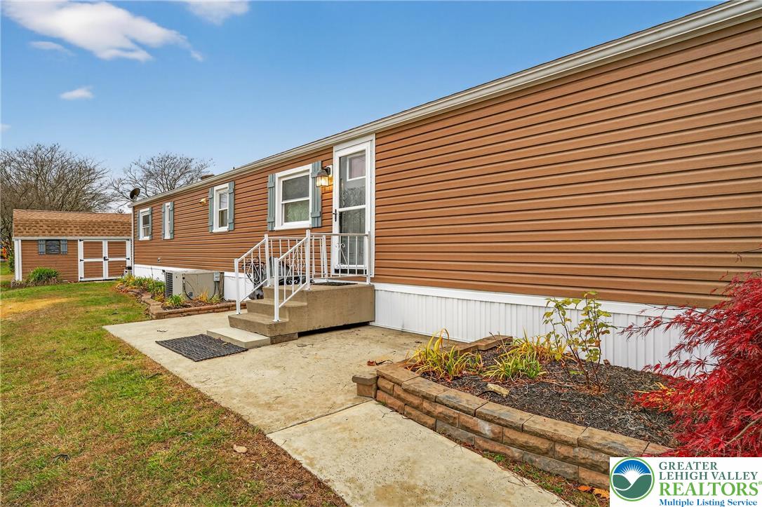 12 Revolutionary Road Mount Bethel, PA 18343 - Photo 38 of 53 a front view of a house with garden
