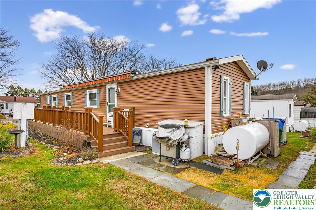 12 Revolutionary Road Mount Bethel, PA 18343 - Photo 39 of 53 a view of a house with backyard and sitting area
