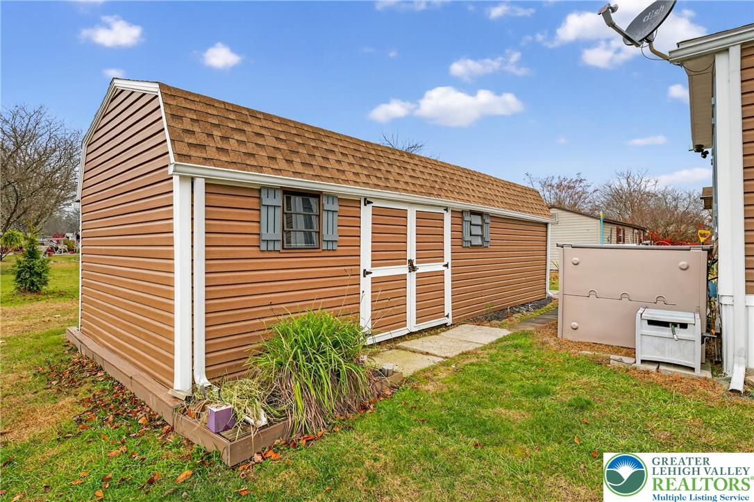 12 Revolutionary Road Mount Bethel, PA 18343 - Photo 40 of 53 a view of a back yard of the house