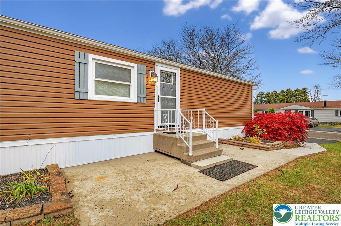 12 Revolutionary Road Mount Bethel, PA 18343 - Photo 4 of 53 a view of a house with a yard and garage