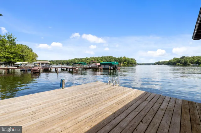 a view of balcony with couch and wooden floor