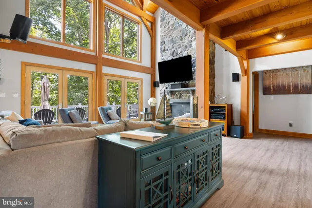 a kitchen with stainless steel appliances granite countertop a sink and a refrigerator