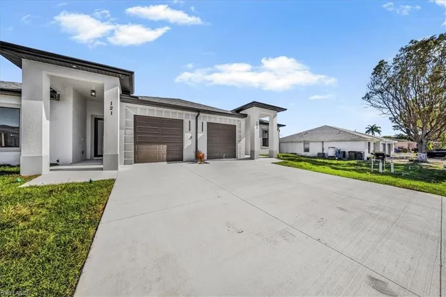 front view of a house with a small yard
