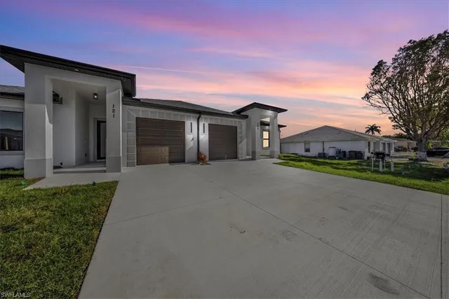 front view of a house with a street