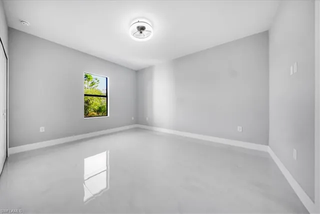 a view of a kitchen with a sink and cabinet area