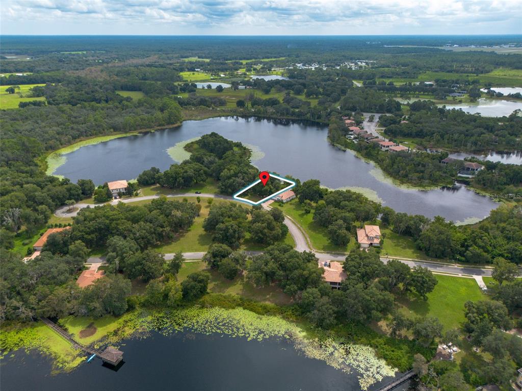 3613 Azurite Court DeLand, FL 32724 - Photo 14 of 20 an aerial view of residential houses with outdoor space and river
