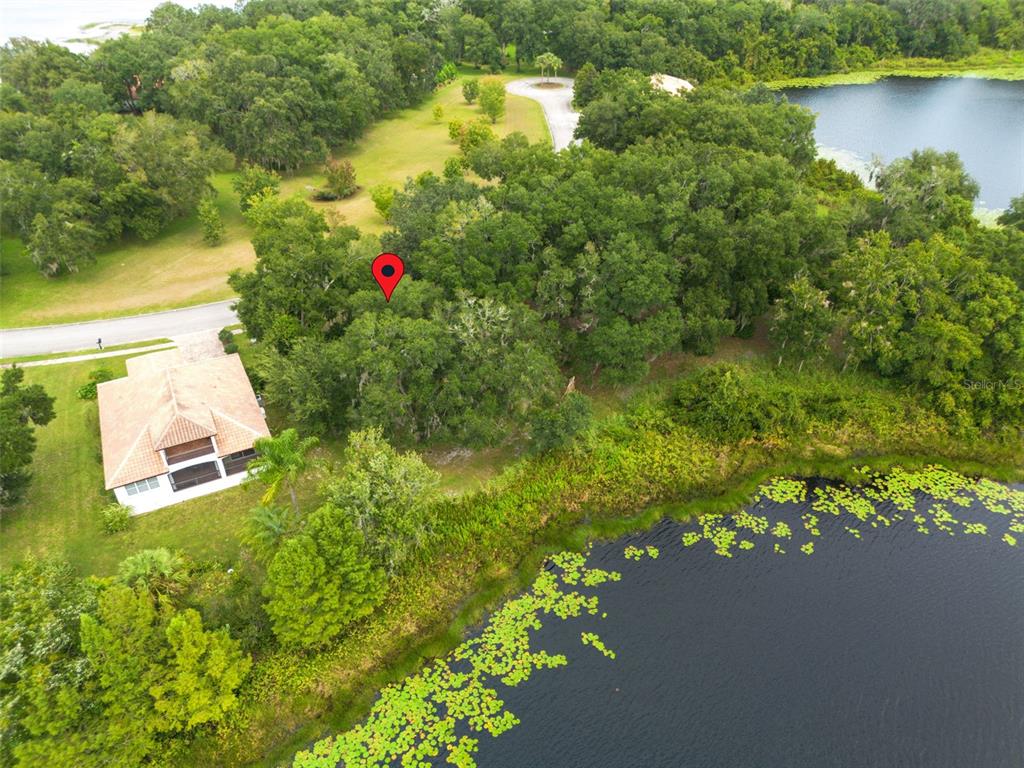 3613 Azurite Court DeLand, FL 32724 - Photo 18 of 20 an aerial view of residential houses with outdoor space and trees