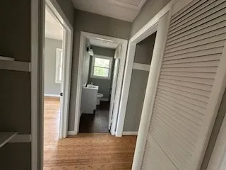 a view of a bathroom from a hallway