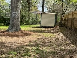 a view of a backyard of a house