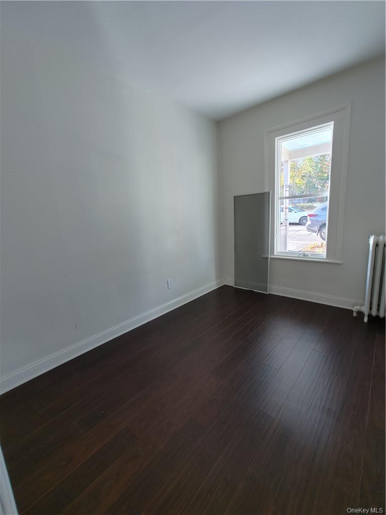 7 Prospect Street, Unit 1 Nyack, NY 10960 - Photo 13 of 18 a view of room with hardwood floor and window