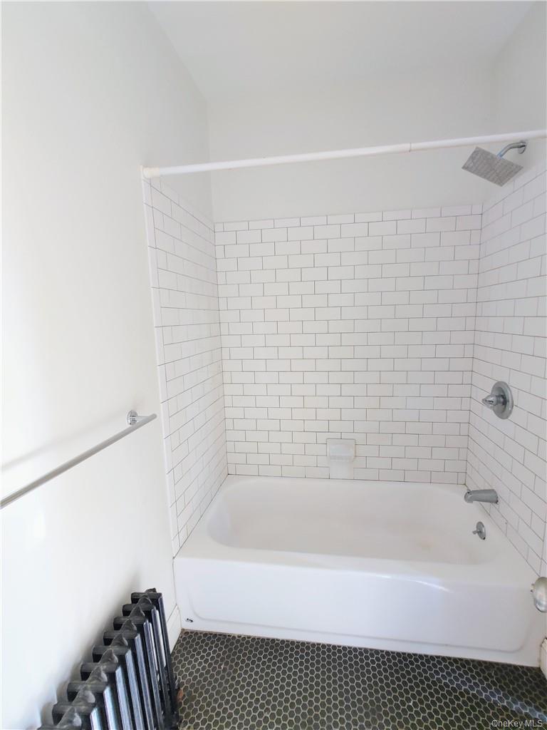 7 Prospect Street, Unit 1 Nyack, NY 10960 - Photo 17 of 18 a bathroom with a bathtub