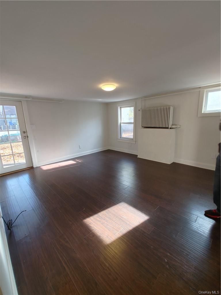 7 Prospect Street, Unit 1 Nyack, NY 10960 - Photo 6 of 18 a view of empty room with wooden floor and fan