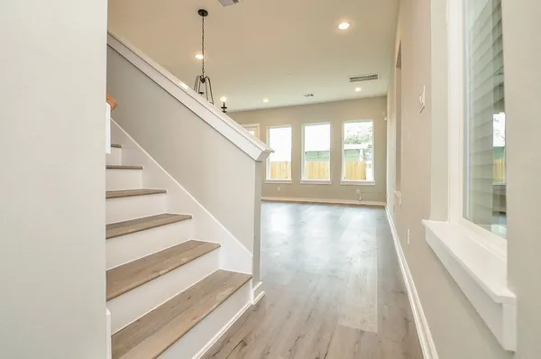 a view of kitchen with wooden floor
