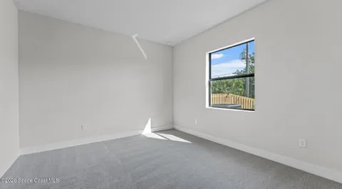an empty room with a window