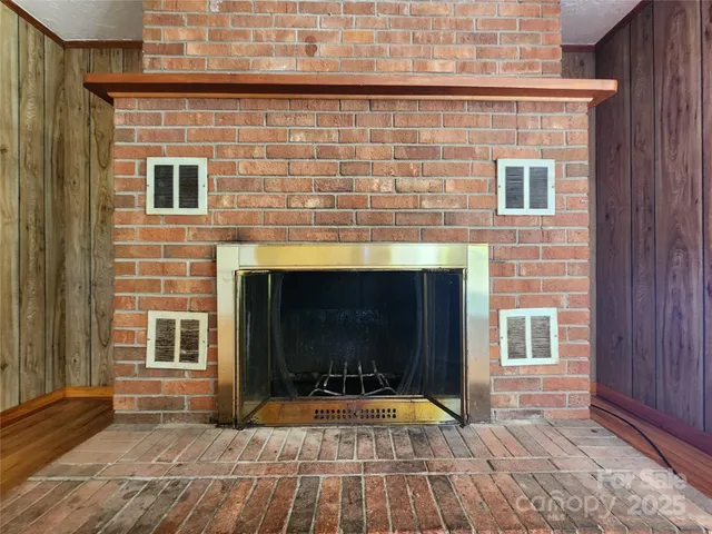 a view of a brick house with entryway and front door