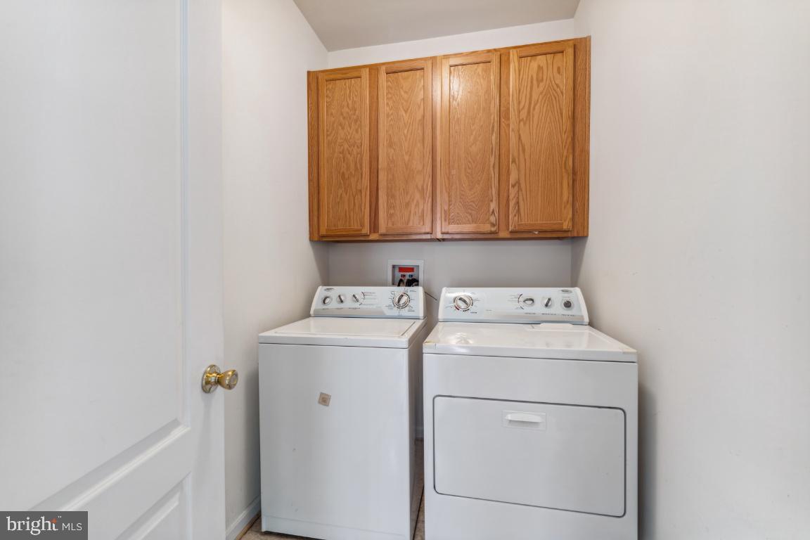 10103 Rolling Green Way Fort Washington, MD 20744 - Photo 12 of 39 a utility room with dryer and washer