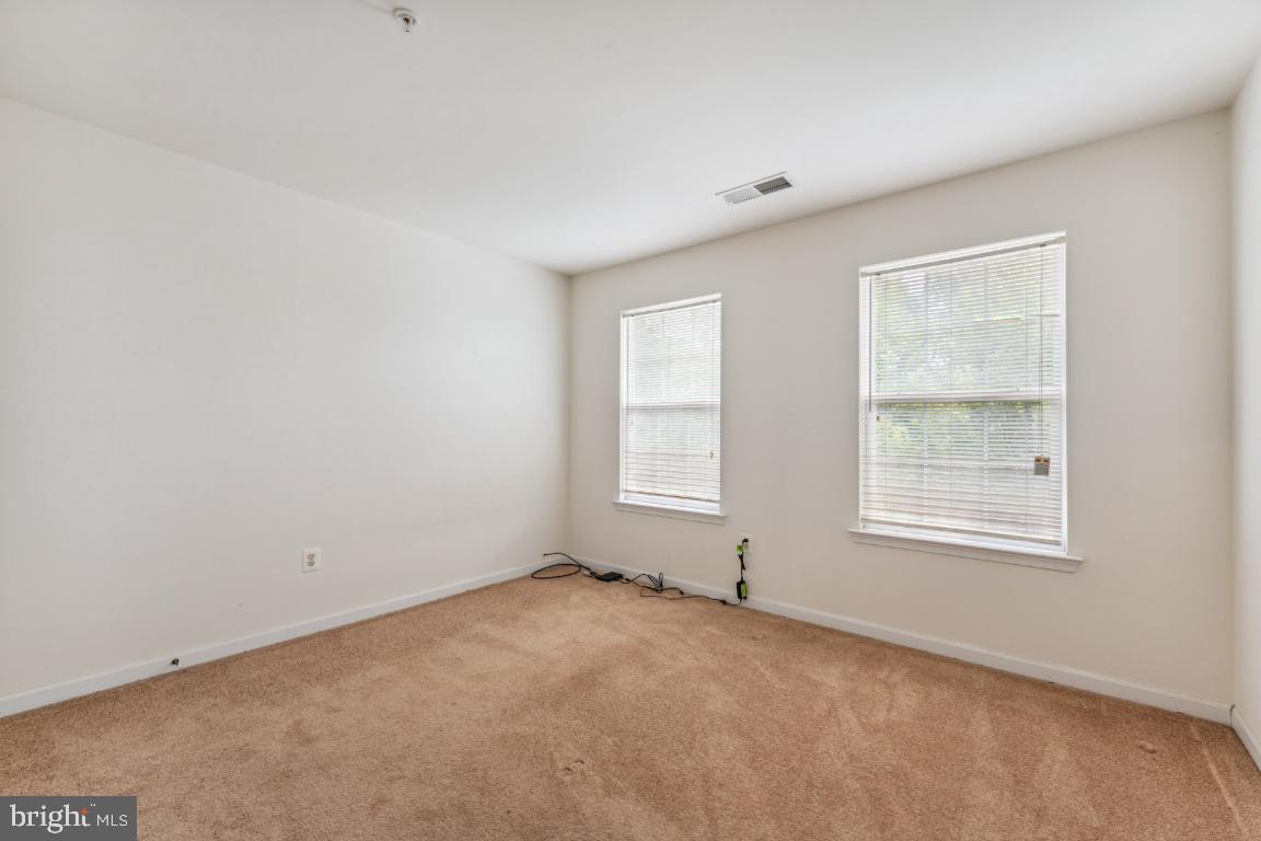 10103 Rolling Green Way Fort Washington, MD 20744 - Photo 30 of 39 an empty room with a window