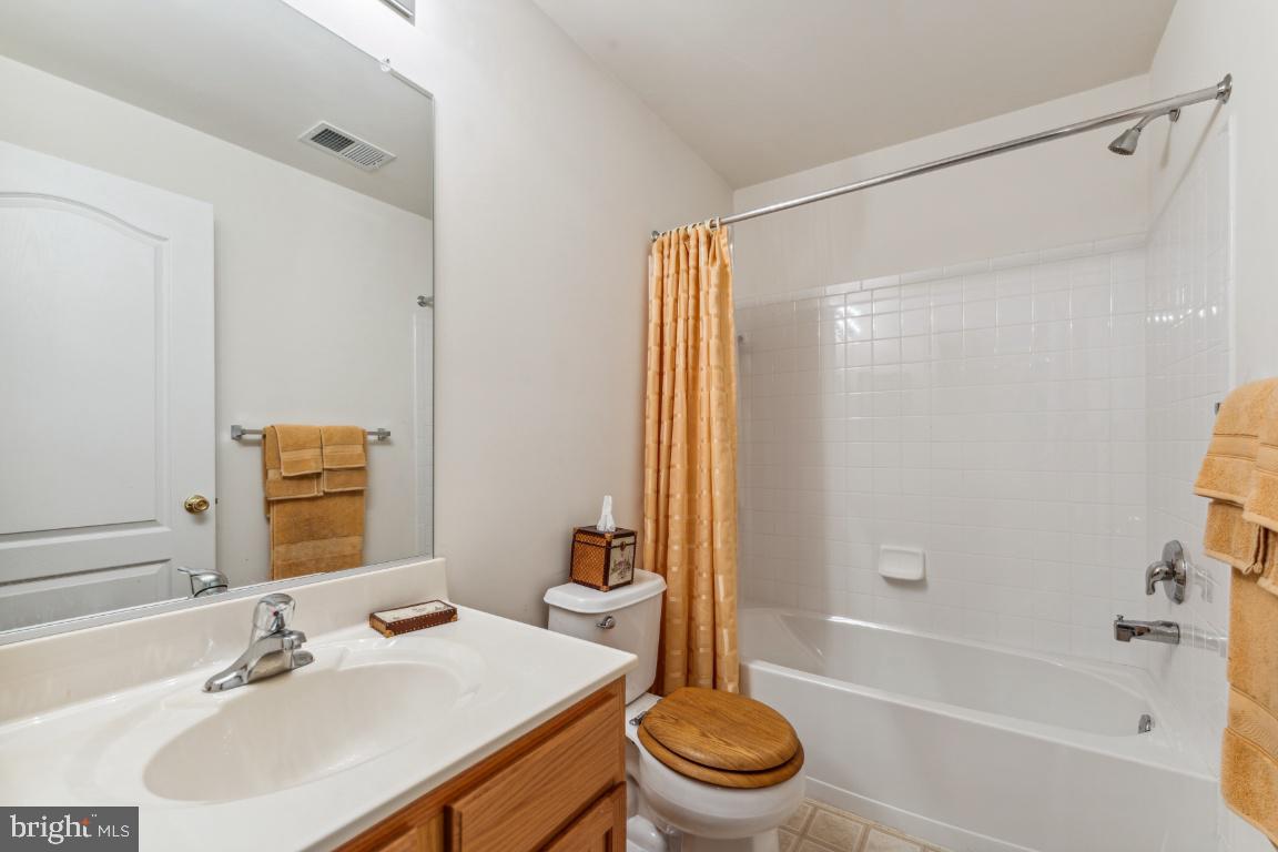 10103 Rolling Green Way Fort Washington, MD 20744 - Photo 33 of 39 a bathroom with a sink toilet and shower