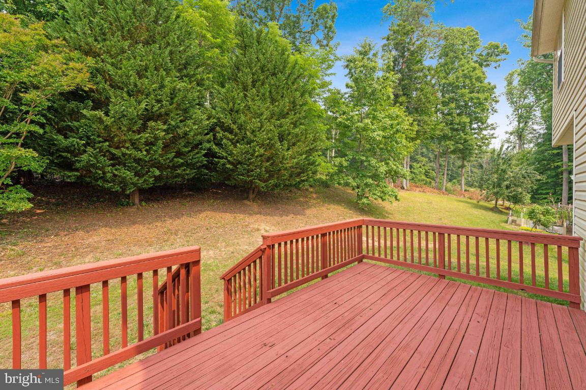 10103 Rolling Green Way Fort Washington, MD 20744 - Photo 35 of 39 a view of deck with wooden floor and fence