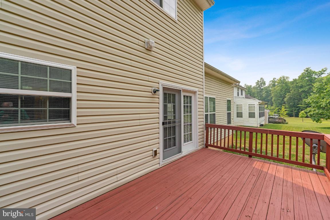 10103 Rolling Green Way Fort Washington, MD 20744 - Photo 36 of 39 a view of a house with a deck